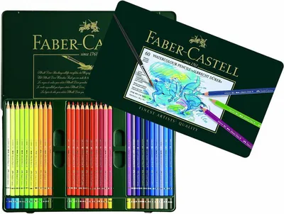 A tin of Faber-Castell watercolor pencils is open, displaying the pencils arranged by color. The lid of the tin is propped open, showing a graphic and text.