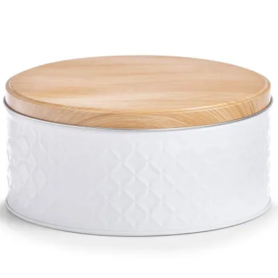 A white metal tin with a wooden lid.