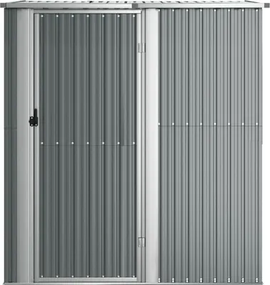 A front view of a gray metal shed with a door on the left.