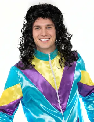 A man wearing a wig and a colorful jacket.