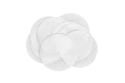 A pile of round, white, fabric-like pads.