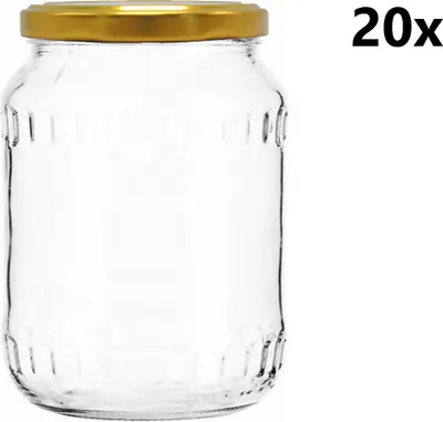 A clear glass jar with a gold lid is shown against a white background.
