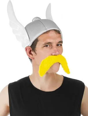A man wearing a silver helmet with white wings and a yellow mustache.