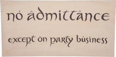 A wooden sign with text written in a stylized font.