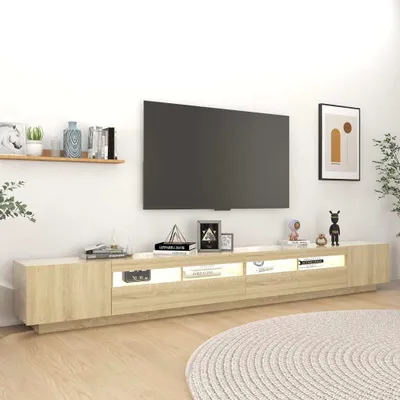 A modern living room setup with a TV stand and a large television.