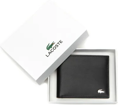 A black Lacoste wallet is presented in its white branded box.