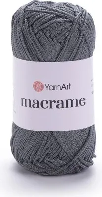 A ball of grey yarn with a white label.