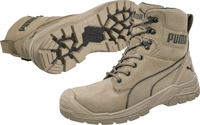 A pair of tan Puma work boots are shown against a white background. One boot is shown from the side, and the other is shown from the sole.