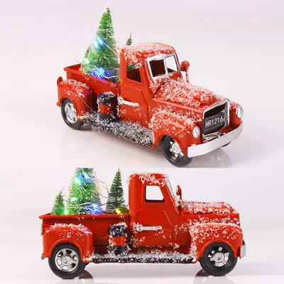 Imagen del producto de Camión vintage rojo de metal con motivos navideños, ideal para decorar el hogar, la chimenea, escritorios y otros espacios durante las fiestas. Incluye adornos con árboles de Navidad. Suministros navideños