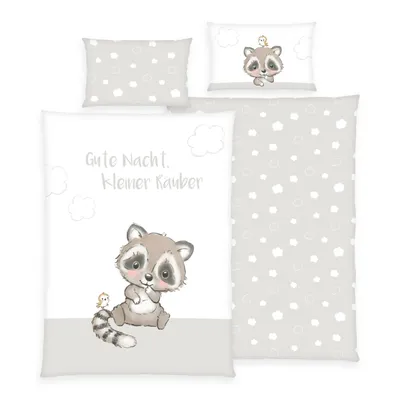 A flat lay of a bedding set featuring a raccoon illustration.