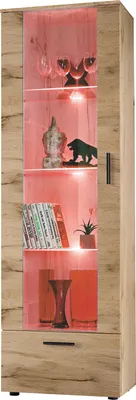 A tall, narrow display cabinet with glass doors and shelves, illuminated by pink LED lights. It contains various decorative items.