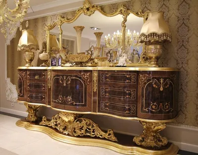 Produktbild von Casa Padrino Luxus Barock Sideboard mit Spiegel Braun / Antik Gold 305 x 50 x H. 232 cm - Prunkvoller Massivholz Schrank mit Wandspiegel - Edle Möbel im Barockstil - Luxus Qualität