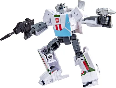 A white Transformer action figure with blue and red accents on its chest, holding weapons in both hands.