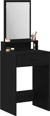 A black vanity table with a mirror and a small shelf.
