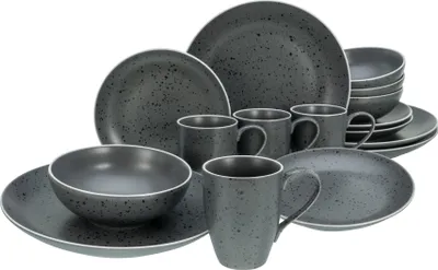 A collection of dark gray speckled stoneware dishes and mugs arranged on a white background.