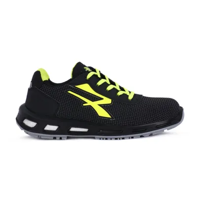 A single black and yellow safety shoe is shown against a white background.
