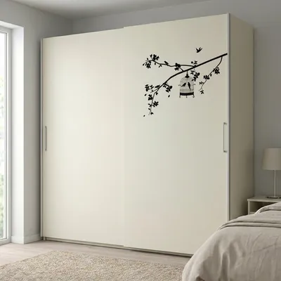 Produktbild von Dekorative Wandaufkleber mit einem Baum und einem Vogelkäfig