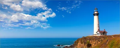 Produktbild von Wallario Poster - Leuchtturm auf einem Felsvorsprung - Blauer Himmel, Kunstdruck Größe: 80 x 200 cm