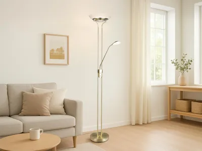 A living room scene with a sofa, floor lamp, and a window.