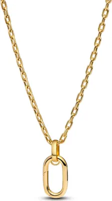 A close-up studio shot of a gold necklace with a single oval link pendant.