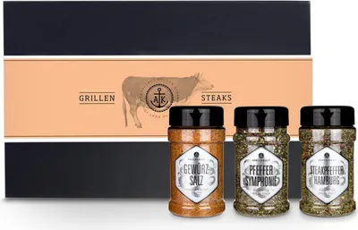 A gift box containing three spice jars for grilling steaks.
