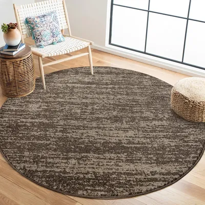 Image de Tapis rond Unyqoos® Oslo, à poils courts, unie, en polypropylène, couleur marron, diamètre 150 cm, 1850 g/m², facile d'entretien