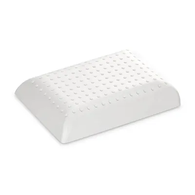 A white latex pillow with a dimpled surface is shown on a white background.