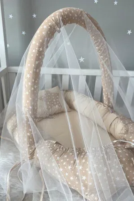 Image de Nid pour bébé Jaju avec coussin et jouets suspendus, 100 x 60 cm, marron et blanc