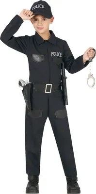 A child dressed in a police costume, posing for a photo.