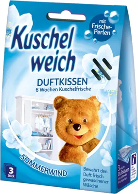 A product package for Kuschelweich Duftkissen (scented cushions) with a teddy bear illustration and images of a wardrobe and flowers.
