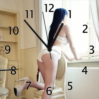 Produktbild von Wallario Design Wanduhr Sexy Dessous - Junge Frau mit eleganten Beinen am Fenster aus Echtglas, Größe 30 x 30 cm