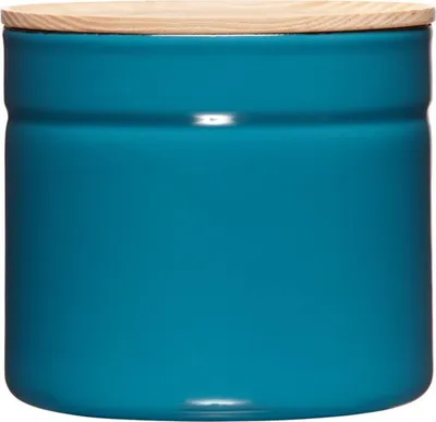 A teal ceramic canister with a wooden lid.