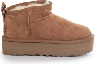 A single brown UGG boot with a platform sole is shown against a white background.