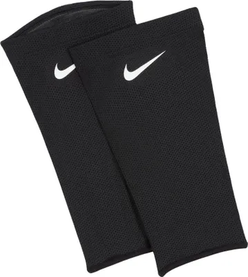 A pair of black Nike Guard Lock Elite Sleeves with white Nike logos.