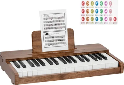 Zdjęcie produktu dla Klawiatura dla dzieci SucceBuy z 37 klawiszami, cyfrowe pianino drewniane dla dzieci od 3 lat, kompaktowy instrument muzyczny z autentycznym brzmieniem, podwójne zasilanie, regulacja głośności, wczesna edukacja muzyczna, wygląd orzechowy