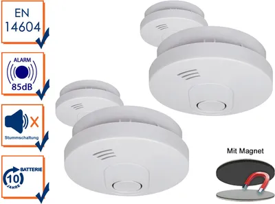 A set of white smoke detectors with informational icons on the left and a magnetic mounting kit shown at the bottom right.