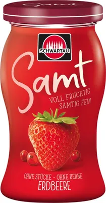 A jar of strawberry jam with a strawberry on the front.