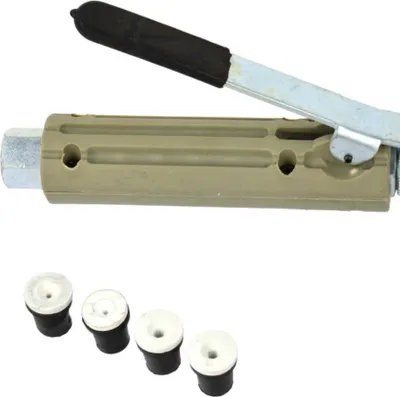 A close-up studio shot of a sandblasting gun with ceramic tips.