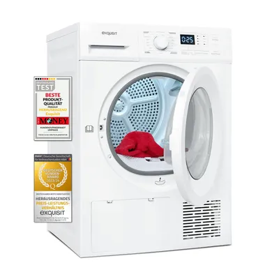 A white Exquisit heat pump dryer with its door open, showing a red towel inside. Several award badges are attached to the left side of the dryer.