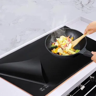 Immagine prodotto di Tappetino protettivo per piano cottura a induzione - Resistente al calore - 1 pezzo - Silicone