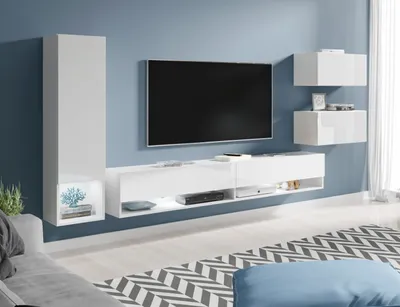 A modern living room with a wall-mounted entertainment unit and TV.