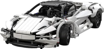 A white Lego Technic sports car is shown from a three-quarter front angle against a white background.