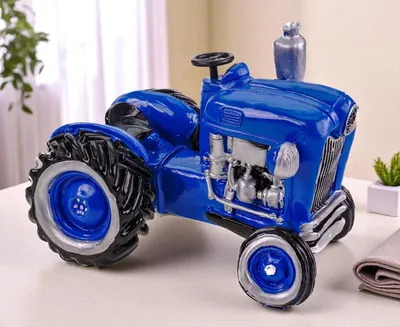 Produktbild von Kremers Schatzkiste Spardose Traktor blau Handbemalt Polyresin Sparschwein 16 cm