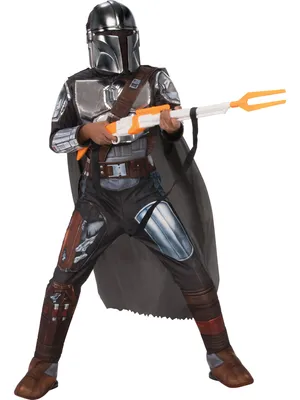 A child wearing a Mandalorian costume from Star Wars, holding a toy rifle.