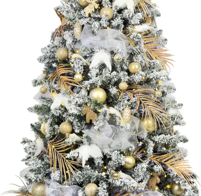 A decorated artificial Christmas tree with white flocking and gold ornaments.