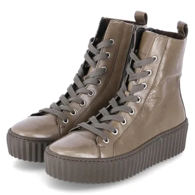 A pair of olive-colored leather high-top boots with laces and a thick platform sole, presented on a white background.
