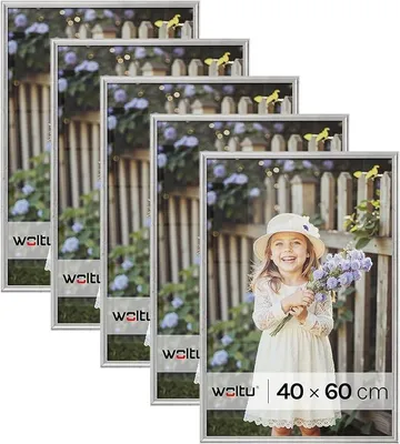 Imagen del producto de Juego de 5 marcos para fotos de 40x60 cm, fabricados en madera maciza e incluyendo un fondo blanco