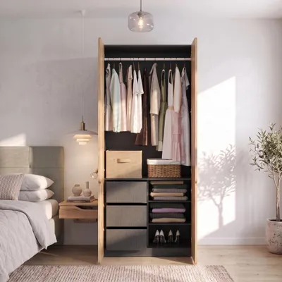 Produktbild von STILVORA Kleiderschrank mit 4 Türen und 1 Kleiderstange, Drehtürenschrank mit 3 Schubladen, Mehrzweckschrank im modernen Stil, Eichenoptik, KI-generiertes Bild