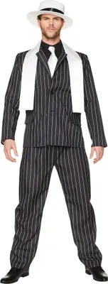 A man wearing a retro gangster costume.
