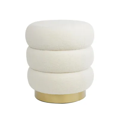 A white teddy fabric pouf with a gold base, presented on a white background.